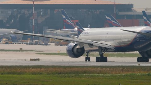 MOSCOW, RUSSIAN FEDERATION - JULY 30, 2021: Boeing 777 of Aeroflot on runway start before takeoff at Sheremetyevo International Airport (SVO).