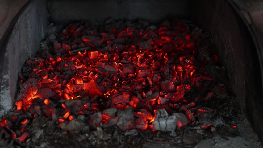 Glowing embers in stove of country house. Royalty-Free Stock Footage #1090211035