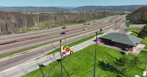 Maryland and USA flag along interstate highway. Aerial view.