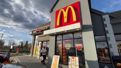 Calgary, Alberta, Canada. May 13, 2022. A McDonald's Restaurant with a Skip the dishes deliveries. 