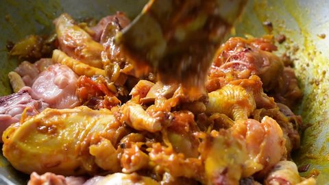 Delicious tasty spicy hot well cooked chicken curry  piece video. Famous in kolkata and all over India. Chicken curry is spicy cooked meat. Bengali dinner, meal. chicken curry video. well cooked 