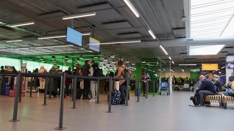 Eindhoven, Netherlands 5 May 2022 :  People waiting in line to board Ryanair at boarding gate Eindhoven airport