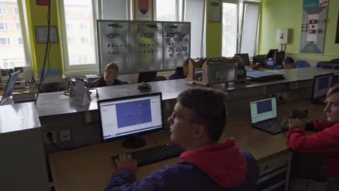 Kysucké Nové Mesto , Slovakia - 04 01 2022: Students Facing Their Computers Inside A Classroom In Vocational Shool Of Kysucké Nové Mesto Town, Slovakia.