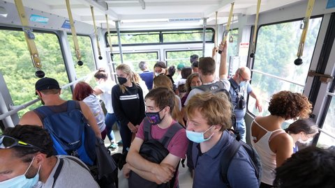 Mont Saleve Haute Savoie France July 2021 Passengers inside teleferic transportation wearing masks during pandemic