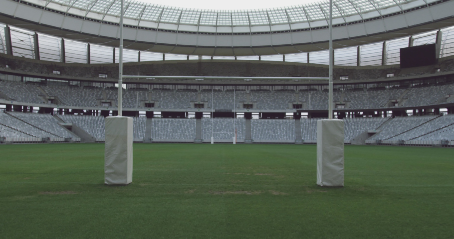 Animation of media icons over stadium. global business, sport and digital interface concept digitally generated video.