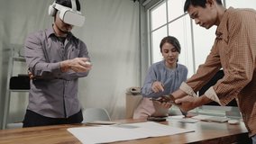 Asian people Architects teamwork using tablet and Virtual Reality headset working with Augmented Reality software application. Augmented reality technology for engineering in the future. - Powered by Shutterstock - Get 15% off with code: PIKWIZARD15