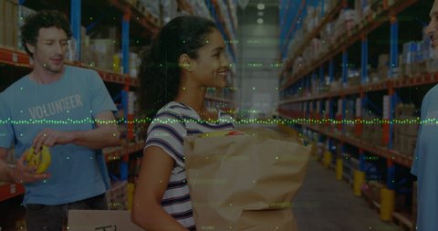 Animation of financial graphs over happy diverse female and male warehouse workers. business, finance and delivery services concept digitally generated video.