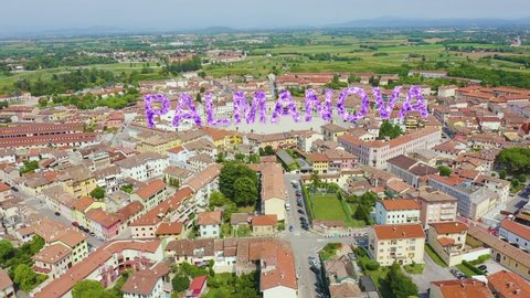 Inscription on video. Palmanova, Udine, Italy. An exemplary fortification project of its time was laid down in 1593. Shimmers in colors purple, Aerial View, Point of interest