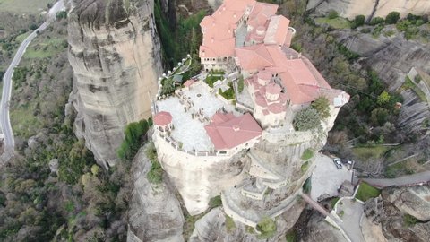 4k cinematic aerial video of medieval monasteries on top of impressive rock formations at Meteora, Greece