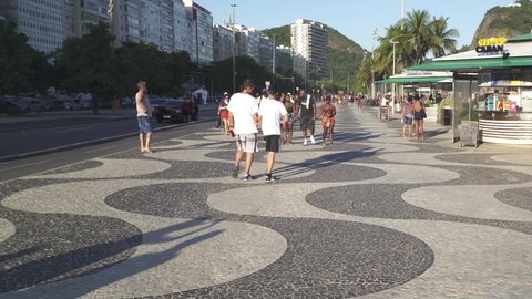 RIO DE JANEIRO, BRAZIL - FEBRUARY 2022: Copacabana beach mosaic sidewalk in Rio de Janeiro