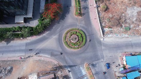 Aerial view of a traffic roundabout with traffic at Kharadi, Pune India.