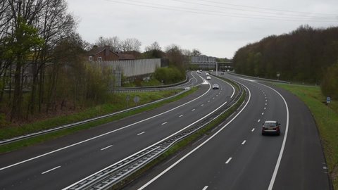 Bunde, Limburg, The Netherlands -  04 06 2022- The A2 - E25 highway with asphalt and traffic, taken from a bridge