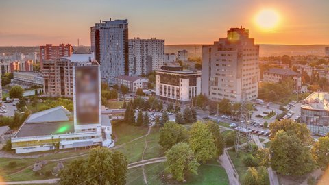 Kharkiv city panorama from above at sunset timelapse. Aerial view of residential districts near botanical garden metro station. Ukraine.