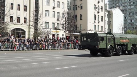 MOSCOW, RUSSIA - May 9, 2022: Column operational-tactical missile system spu 9p78-1 otrk Iskander-m after the parade in honor of Victory Day along Novy Arbat in Moscow from the parade dedicated to the