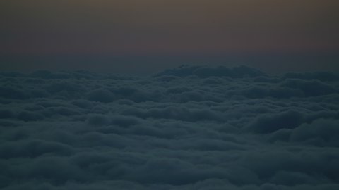 8K 7680x4320.Before sunrise over the clouds.Sea of cloud on mountain peak.Time lapse cloudscape in morning.Nature landscape summit top aerial best background beautiful sunup at dawn twilight early awe