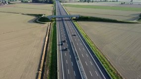 Europe, Italy , Milan - Drone aerial view of highway with traffic car movement - increase in the cost of gasoline and oil fuel - Milan Genova auto street car in Lombardy