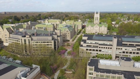 Newton , MA , United States - 05 08 2022: Drone Flight Above Boston College Campus on Beautiful Spring Day
