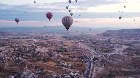 hot air balloons fly in Cappadocia, shooting from a drone in 4k
