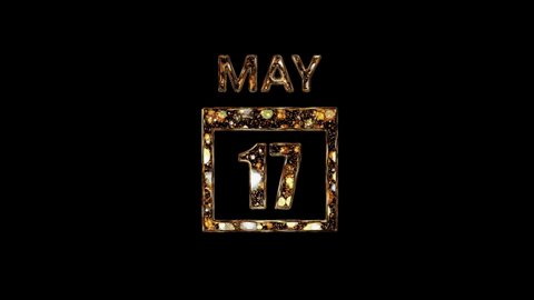 May 17 Calendar. 17 may lettering written in gold letters on a black background. Days of May. 