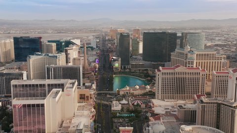 Las Vegas Strip Nevada United States, Apr 2022. Day view from helicopter tour with tourists, favorite tourists attraction. Aerial 4K view Las Vegas hotels, casinos, Eiffel tower and Bellagio fountains