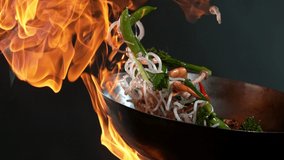 Super slow motion of flying asian mix with prawns. Filmed on high speed cinema camera, 1000 fps. Speed ramp effect. - Powered by Shutterstock - Get 15% off with code: PIKWIZARD15