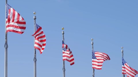 American Flags Waving in the Wind in Slow Motion