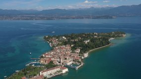Point of interest at high altitude of the famous peninsula of Sirmione in Italy on Lake Garda. Video panorama of lake garda.