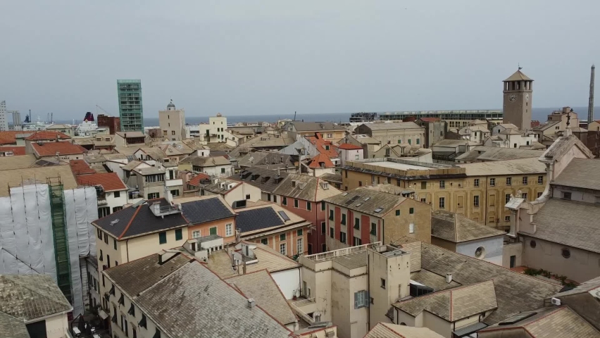 Flying ove Savona rooftops, Liguria
