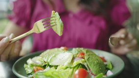Asian woman vegetarian healthy eating salad avocado. Vegan food. - Powered by Shutterstock - Get 15% off with code: PIKWIZARD15