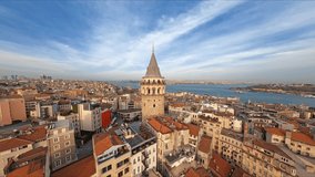 Drone footage of Galata tower in Istanbul in Turkey. Gorgeous historical castle near Bosphorus. Aerial shot of old town. Galata Kulesi Museum, Beyo lu district, quarter. Historical place. Summertime