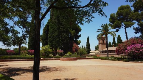 Alhambra, Granada, Spain - July 18 2019 : A view of the gardens of the Nasrid Palace within the complex.