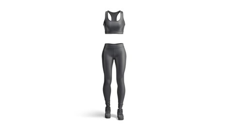 Blank black women sport uniform mockup, looped rotation, 3d rendering. Empty female fitness suit with tanktop and legging mock up, isolated on white background. Clear cycled gym sportswear template.