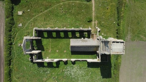Top down shot of St Andrews Church of Covehithe in Suffolk, UK. Drone aerial view from above