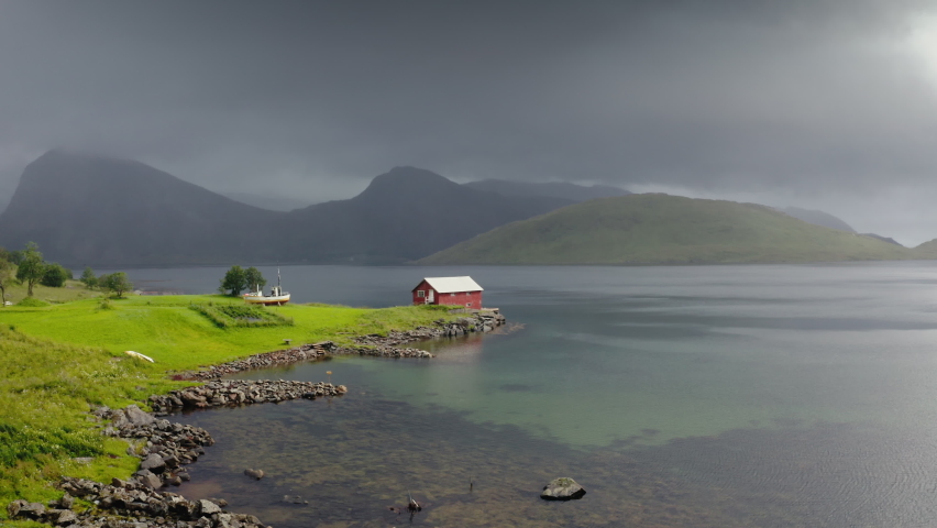 Red House on a lakeshore - Summer in Lofoten