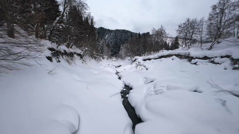 Beautiful nature in Georgia mountains, fast river drone flight