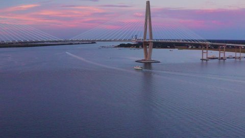 Drone Orbits Right Tracking Boat Under Cooper River Bridge in Charleston South Carolina