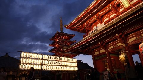 Tokyo, Japan - April 23, 22: Japanese Pagoda and hozomon gate at senso-ji shrine in tokyo, japan after sunset. High quality 4k footage.