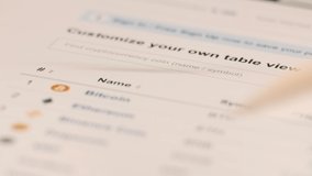 Trader sells and buys cryptocurrencies via modern tablet. Professional investor uses stylus for touch screen. Risk and profit concept extreme closeup - Powered by Shutterstock - Get 15% off with code: PIKWIZARD15