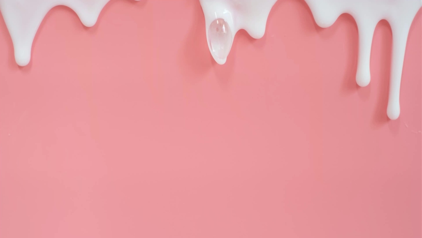 Liquid moisturizing shampoo dripping down on pink background close-up | Shutterstock HD Video #1090309709