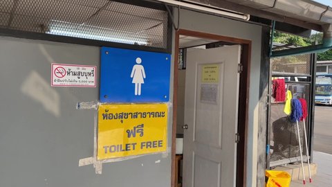 BANGKOK, THAILAND - Circa February, 2022 : Lady restroom at Bangkok bus terminal eastern Ekkamai platform. POV women toilet free sign day time editorial  