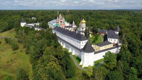 Zvenigorod, Moscow Oblast, Russia - August, 2021: Holy places of the country. Aerial footage of Savvino-Storozhevsky Monastery on sunny day. 