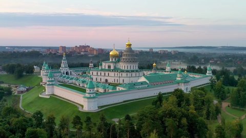Istra, Moscow Oblast, Russia - August, 2021: Holy places of the country. Drone footage of New Jerusalem Monastery at sunrise.