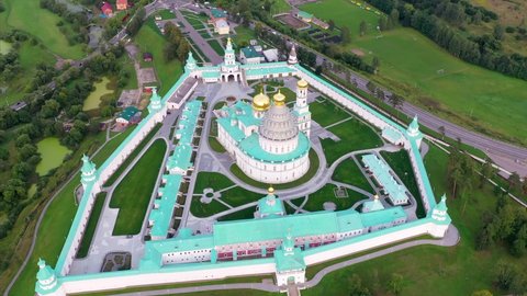 Istra, Moscow Oblast, Russia - August, 2021: Holy places of the country. Drone footage of New Jerusalem Monastery on summer evening.