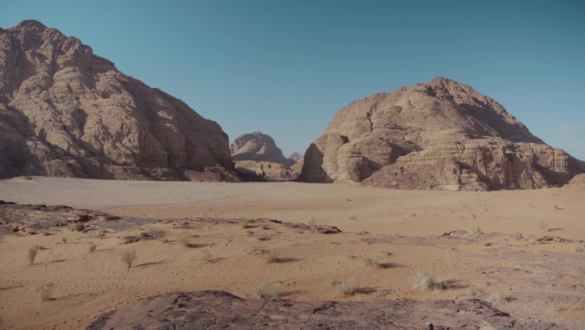 Wadi Rum panoramic views of desert and rocks | Shutterstock HD Video #1090316409
