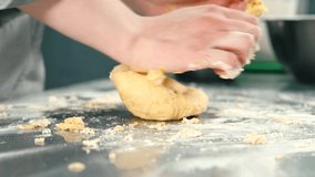 Close up side view video of chef preparing dough for pasta carbonara