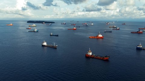 Labuan, Malaysia - May 17, 2022: View of offshore vessels in Labuan, Malaysia. Its specially designed ships for transporting goods and personnel to offshore oil platform that operate deep in oceans.