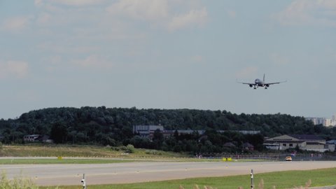 MOSCOW, RUSSIAN FEDERATION - JULY 31, 2021: Long shot, passenger jet plane Airbus A320 of Aeroflot approach before landing at Sheremetyevo airport (SVO)