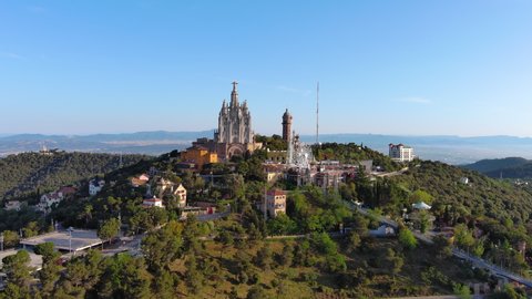 Aerial view of Barcelona skyline with Sagrat Cor temple during a sunny day, Catalonia, Spain