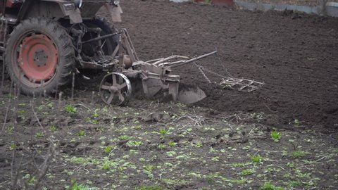Old Belarus tractor on a ground