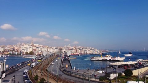 Ferryboats at Golden Horn Bay. Aerial view of Galata bridge and Eminonu pier Kadikoy, Istanbul, Turkey